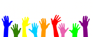 different colored hands up in the air next to each other.