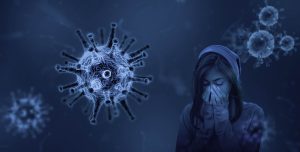 blue picture with a woman and her hands over her mouth, and a viruses around her
