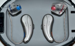hearing aids with one side red and the other blue