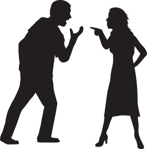 silhouette of a man and a woman arguing 