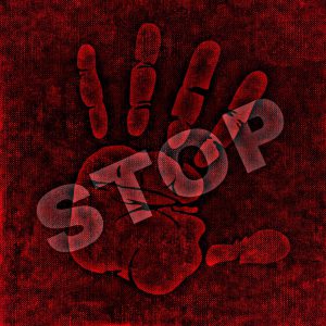 hand with the word stop over it in red