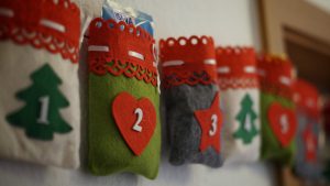 little bags with numbers on them and gifts inside