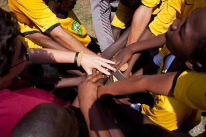 hands on top of each other in a huddle