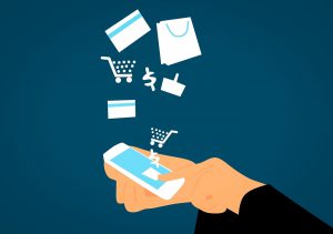 illustration of a hand tapping on a phone screen with shopping carts and gift bags coming out of it