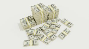 stacks of hundred dollar bills