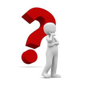 white silhouette of a person with their hand on their chin and a red question mark behind it