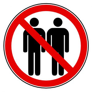 illustration of two silhouettes standing next to each other with a prohibited red sign over them