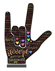 hand showing love in sign language with words of love within it