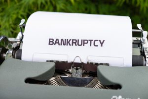 bankruptcy types on a piece of paper on a typewriter