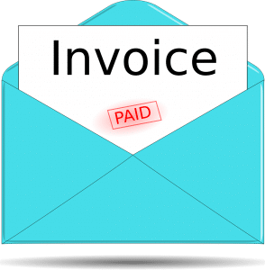 invoice letter sticking out of an envelope
