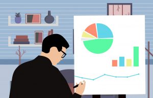 illustration of a man writing on a poster with graphs on it