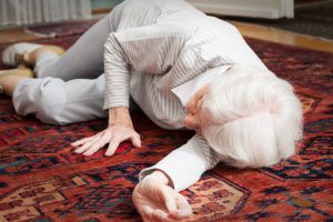older caucasian woman laying on the floor