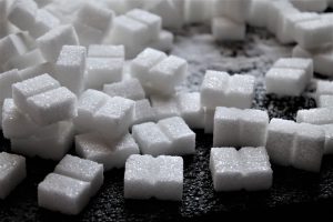 many sugar cubes on a table