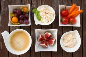 fruits and vegetables in different plates