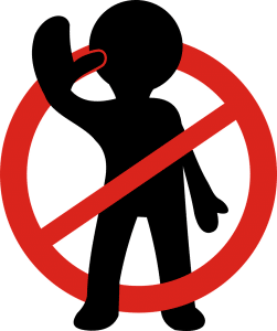 silhouette of a person with their hand up in a red prohibited sign