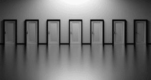 multiple white doors in a row