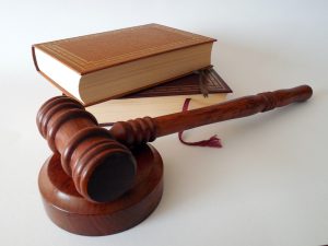 gavel in front of some books