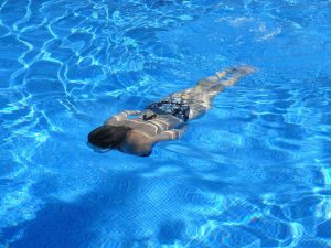 woman swimming in a pool