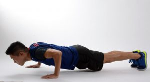 asian man doing a pushup