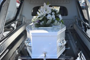 casket in a car