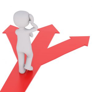 person coming to a crossroad with 3 arrows/directions