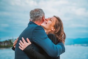 man hugging a woman