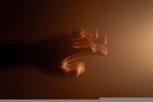 hand that appears to be shaking