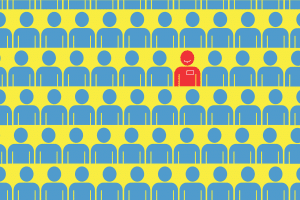 group of people in blue and one standingout in red