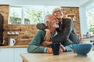 older couple hugging