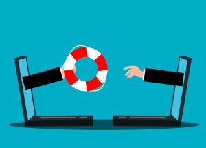 hand coming out of a laptop with a life saver giving another hand it