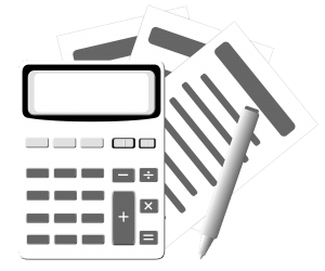 papers behind a calculator