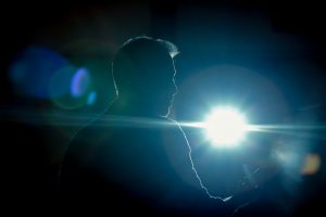 a man speaking to a crowd