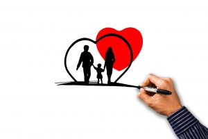 illustration of a silhouetted family walking with a heart drawn around them and a red heart in the background