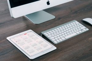 ipad with a calendar pulled up on it