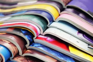 magazines stacked on top of each other