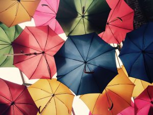 underview of several multi-colored umbrellas