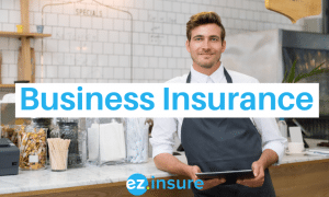 business insurance text overlaying image of a man in an apron leaning on the counter of his business