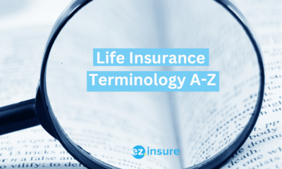 life insurance terminology a-z text overlaying image of a magnifying glass over a dictionary