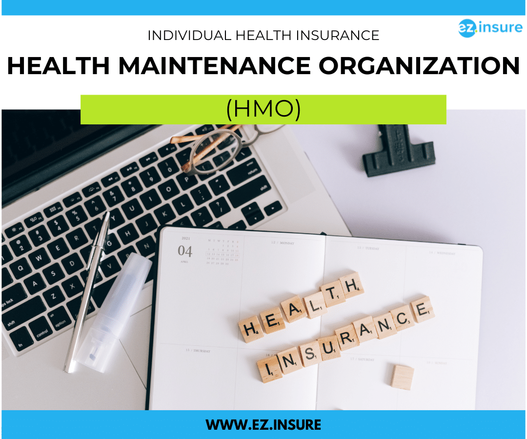 Top-down view of a laptop keyboard and an open planner with wooden letter tiles spelling out "Health Insurance," representing individual HMO health insurance plans from EZ.Insure.